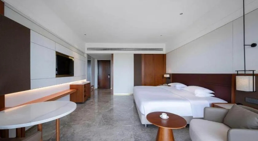 Bed in Grand Soluxe Hotel and Resort Sanya