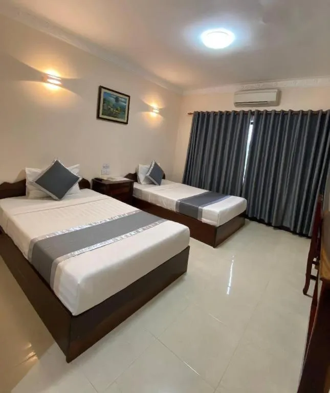 Bed in Asian Koh Kong Hotel