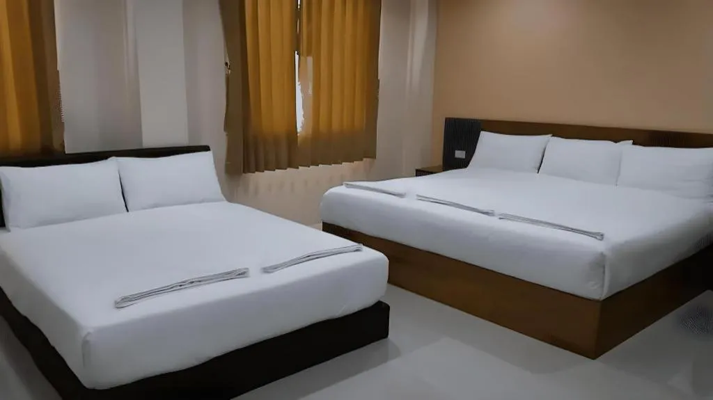 Bed in Regent Room Hotel