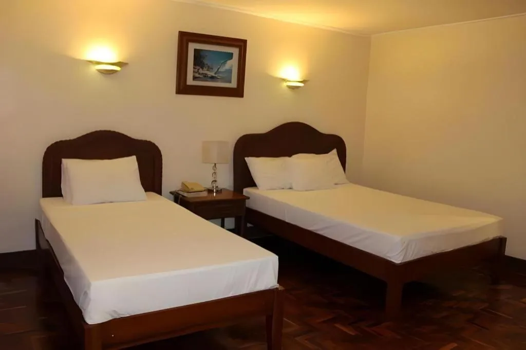 Bed in Vacation Hotel Cebu