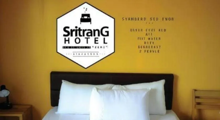 Bed in Sritrang Hotel