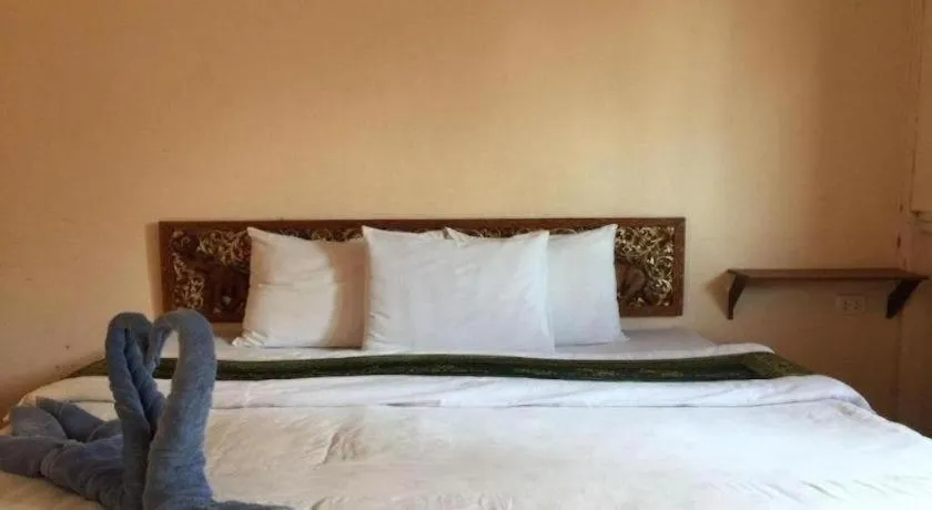 Bed in Sritrang Hotel