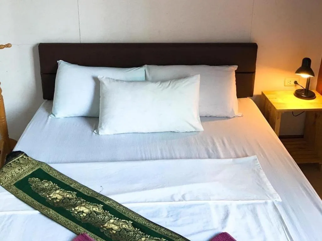Bed in Sritrang Hotel