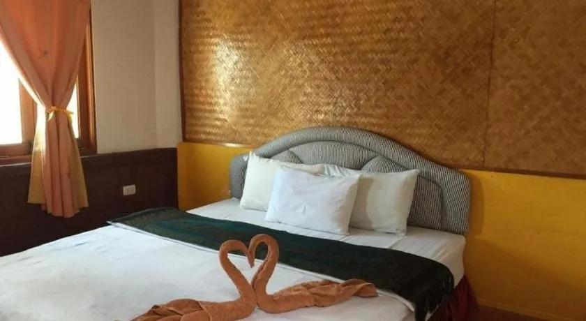Bed in Sritrang Hotel