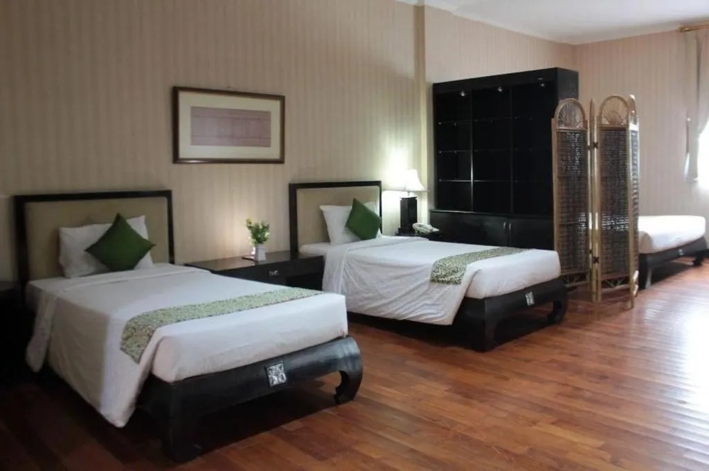 Bed in Campago Resort Hotel