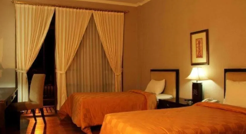 Bed in Campago Resort Hotel