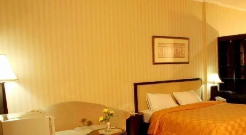 Bed in Campago Resort Hotel