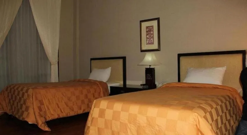 Bed in Campago Resort Hotel