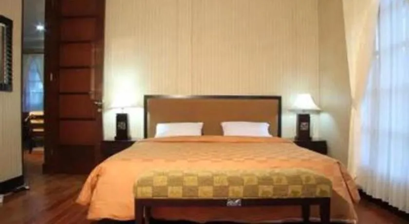Bed in Campago Resort Hotel