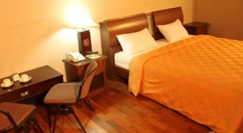 Bed in Campago Resort Hotel