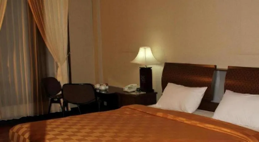 Bed in Campago Resort Hotel