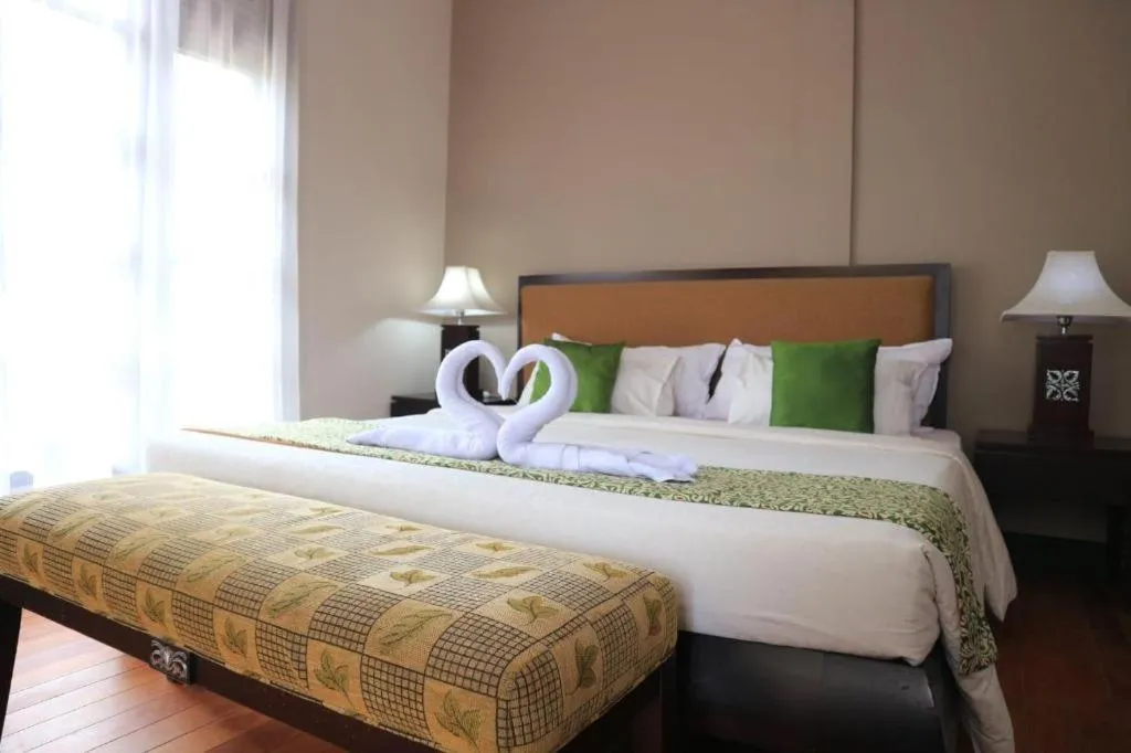 Bed in Campago Resort Hotel