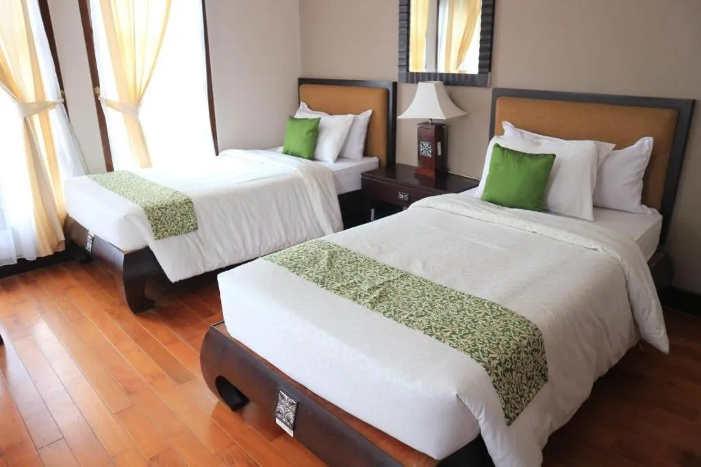 Bed in Campago Resort Hotel