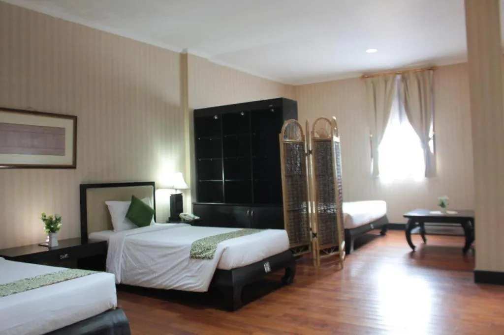 Bed in Campago Resort Hotel