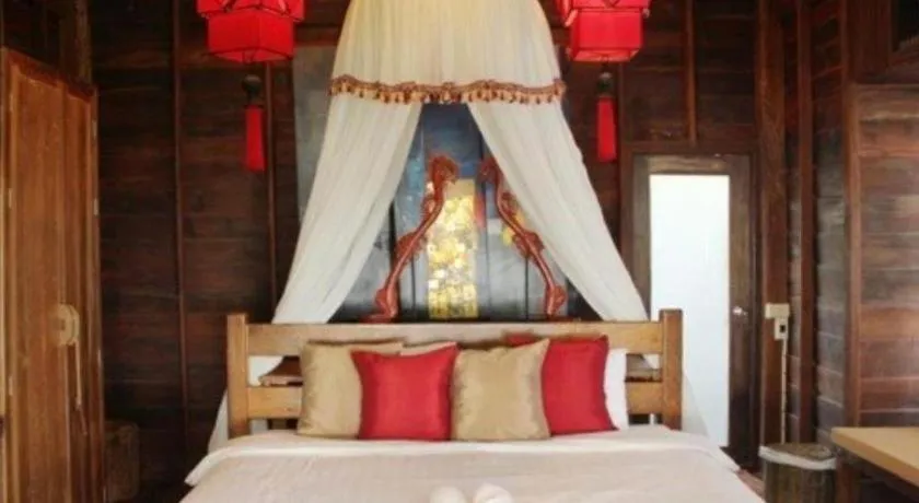 Bed in Chivaree Hotel and Resort
