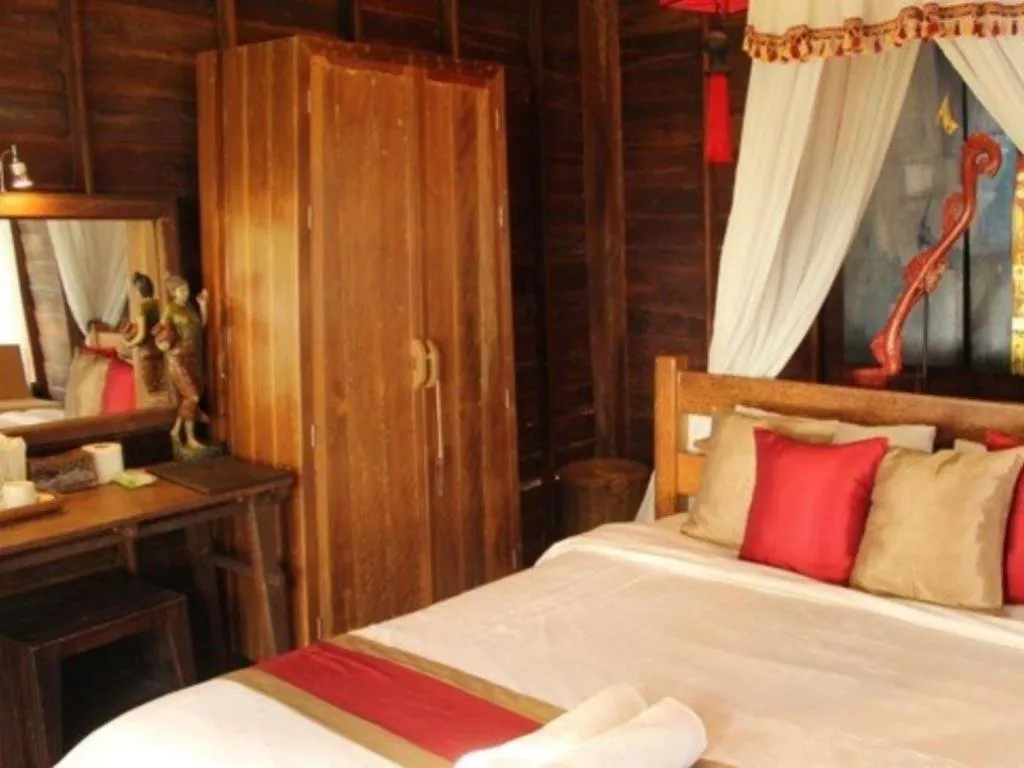 Bed in Chivaree Hotel and Resort