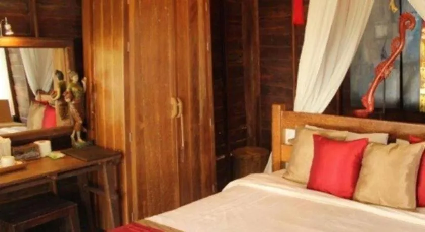 Bed in Chivaree Hotel and Resort