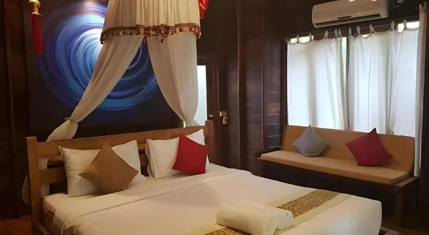 Bed in Chivaree Hotel and Resort