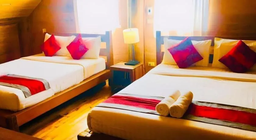 Bed in Chivaree Hotel and Resort