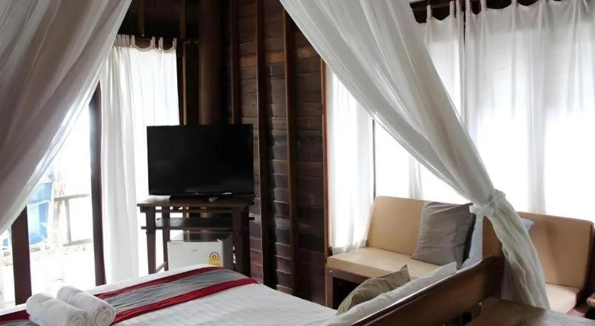 Bed in Chivaree Hotel and Resort
