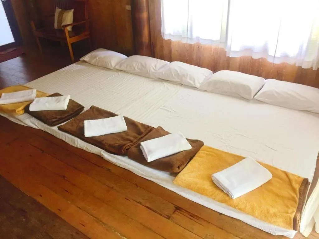 Bed in Chivaree Hotel and Resort