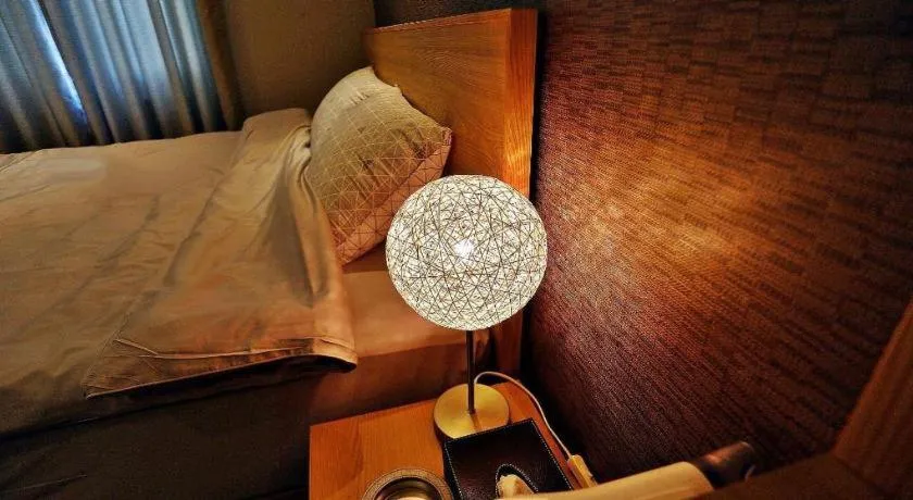 Bed in Jeju Sejong Hotel