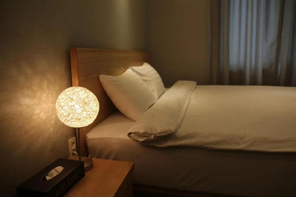 Bed in Jeju Sejong Hotel