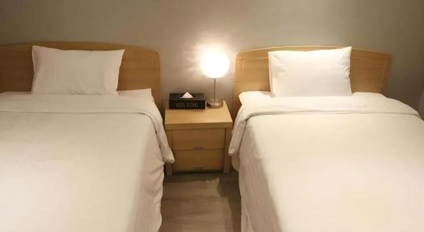 Bed in Jeju Sejong Hotel