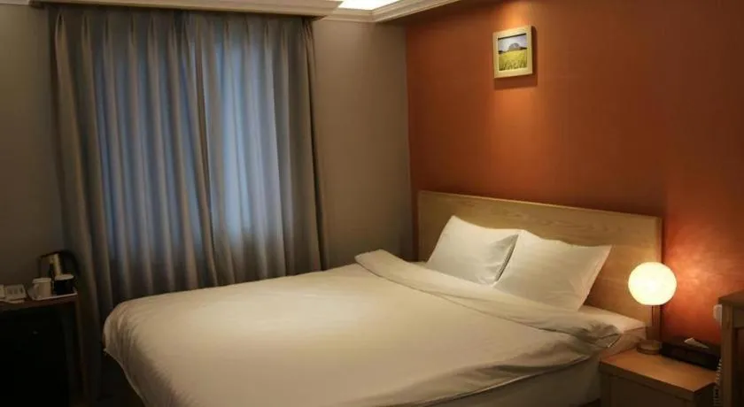 Bed in Jeju Sejong Hotel