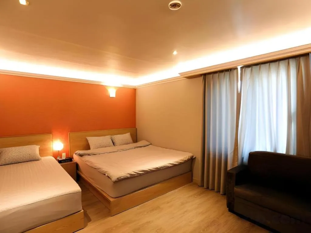 Bed in Jeju Sejong Hotel