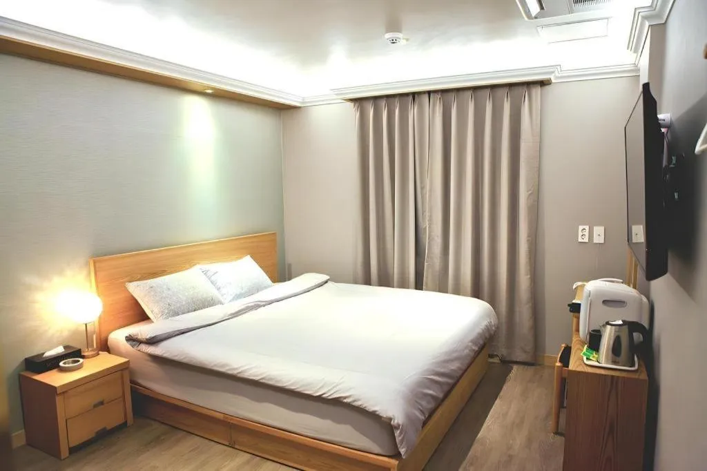 Bed in Jeju Sejong Hotel