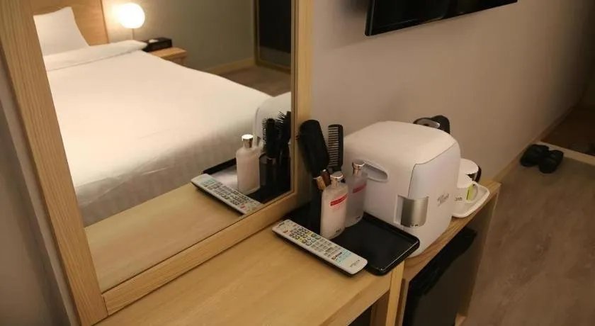 Bed in Jeju Sejong Hotel