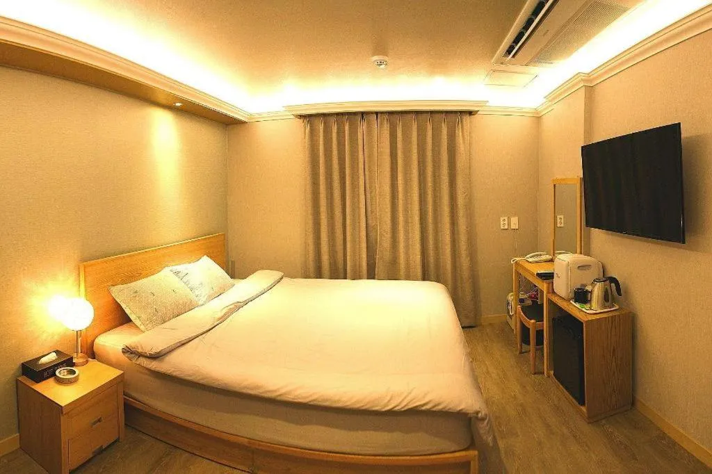 Bed in Jeju Sejong Hotel