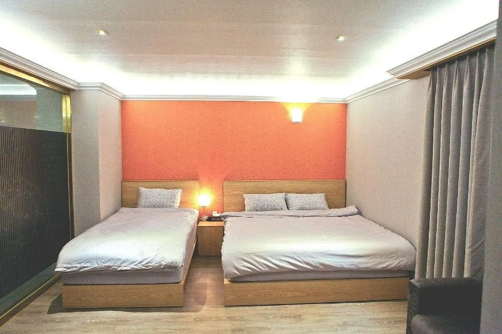 Bed in Jeju Sejong Hotel