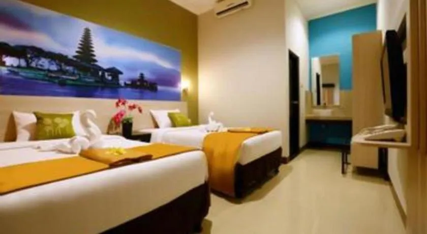 Bed in Asoka City Bali Hotel