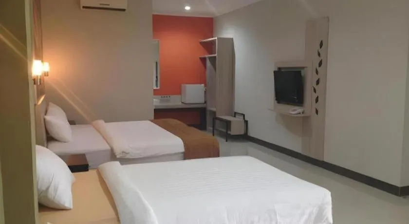 Bed in Asoka City Bali Hotel