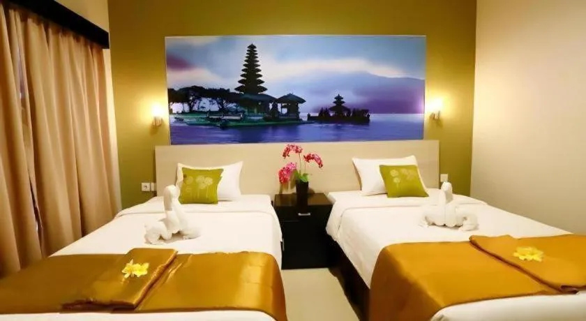 Bed in Asoka City Bali Hotel