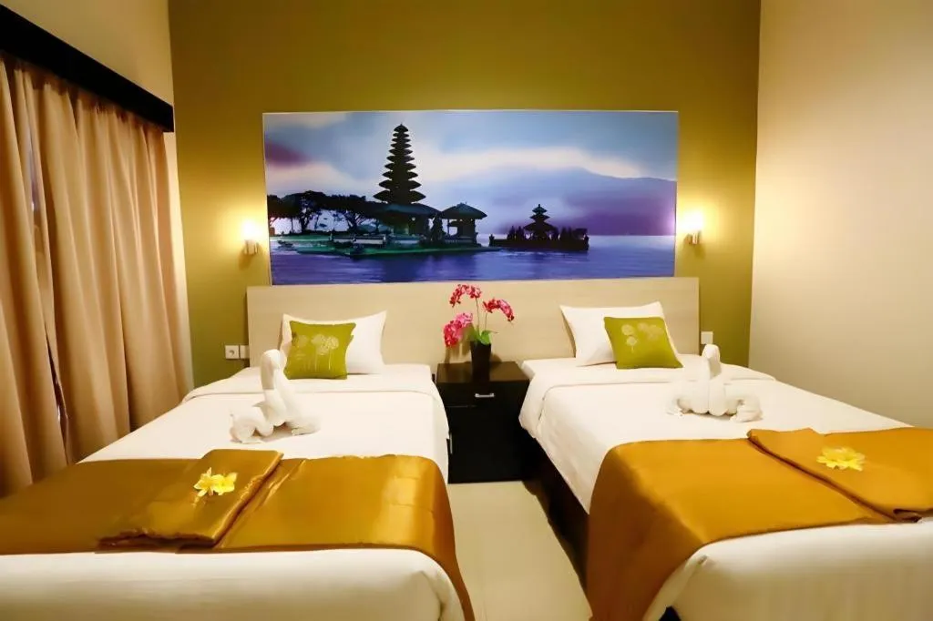 Bed in Asoka City Bali Hotel