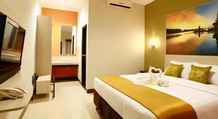 Bed in Asoka City Bali Hotel