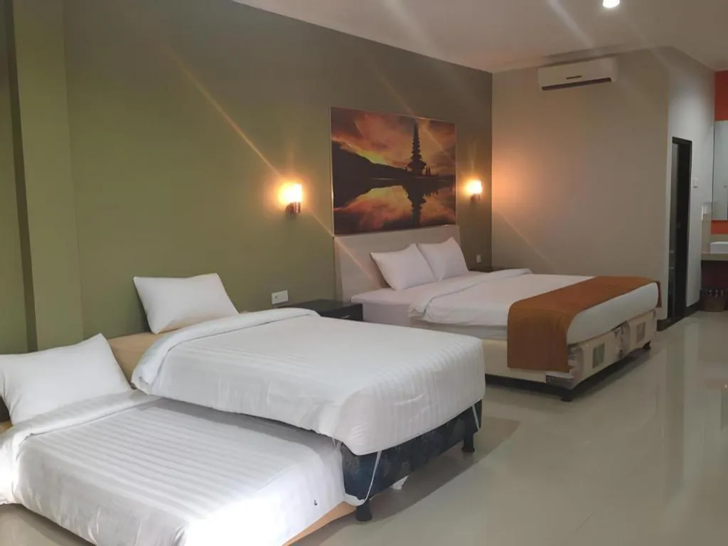 Bed in Asoka City Bali Hotel