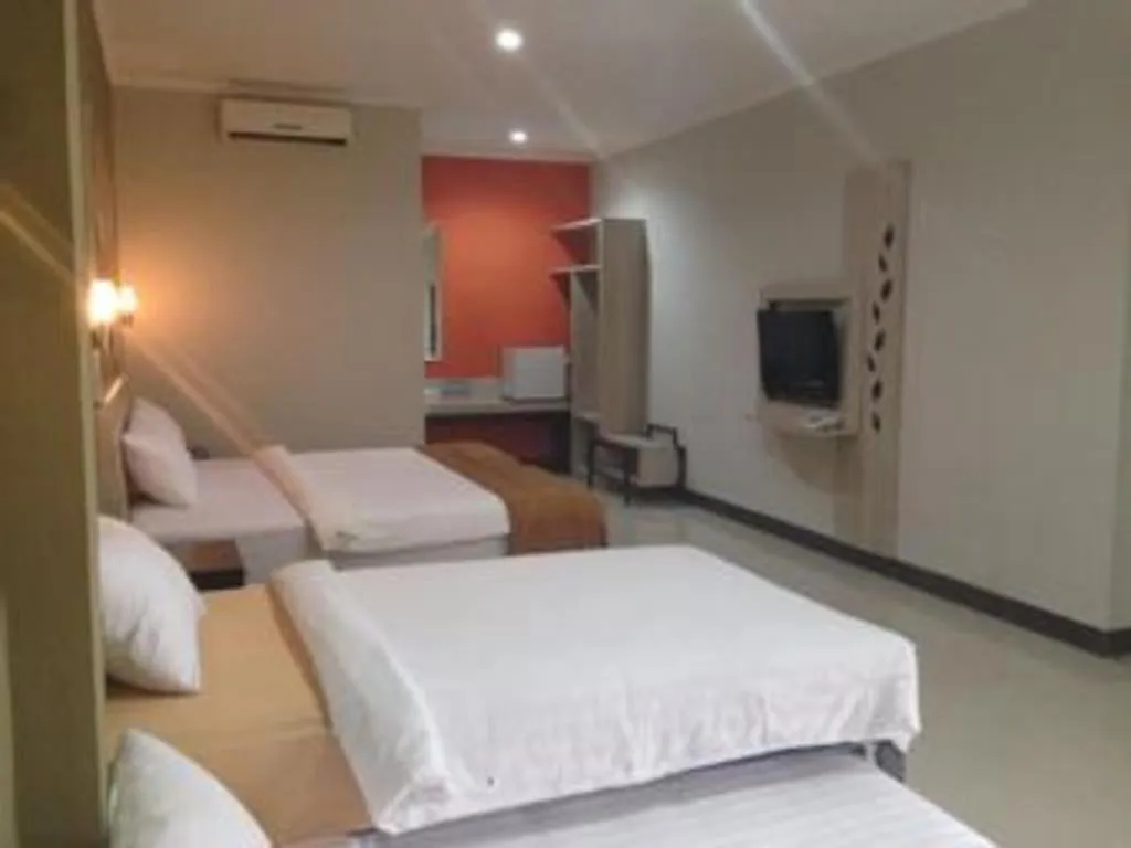 Bed in Asoka City Bali Hotel