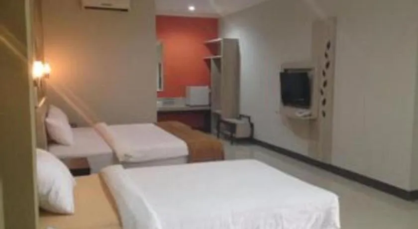 Bed in Asoka City Bali Hotel