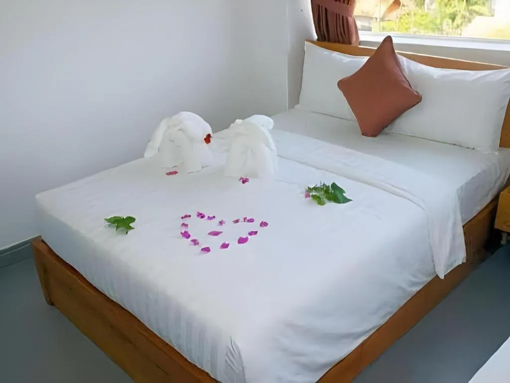 Bed in Damina boutique hotel