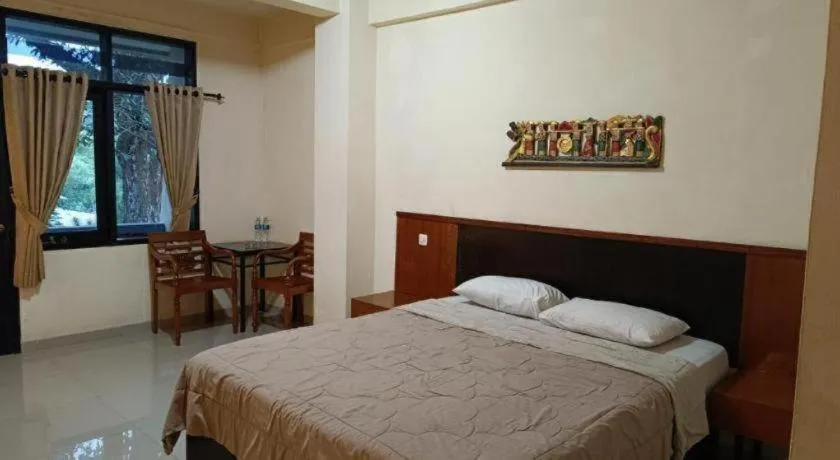 Bed in Augusta Hotel & Glamping Sukabumi