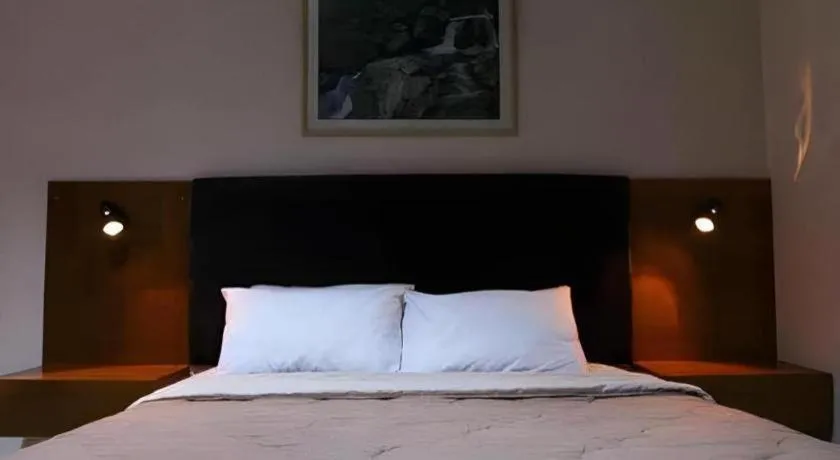 Bed in Augusta Hotel & Glamping Sukabumi