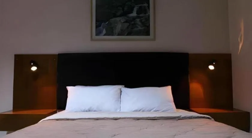 Bed in Augusta Hotel & Glamping Sukabumi