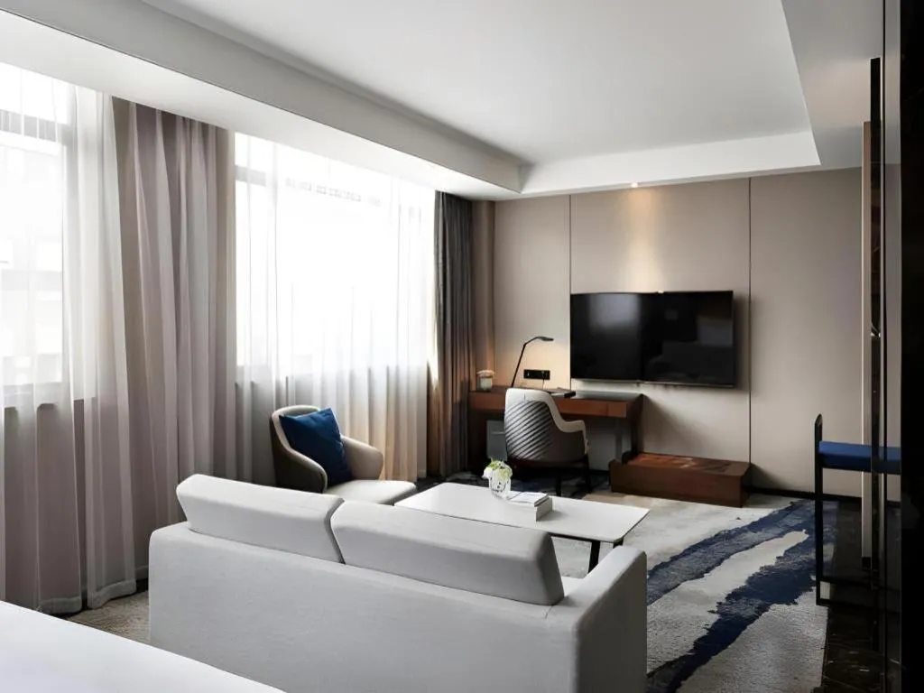 Bed in Zhonghao Boutique Hotel Dalang Business Center