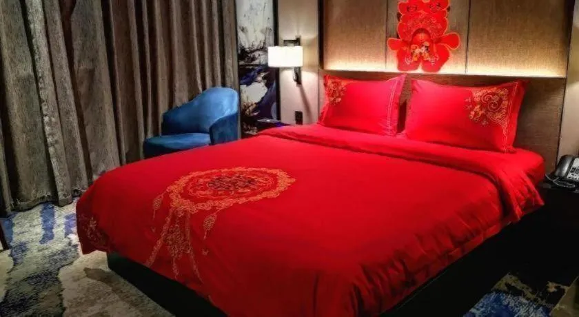 Bed in Zhonghao Boutique Hotel Dalang Business Center