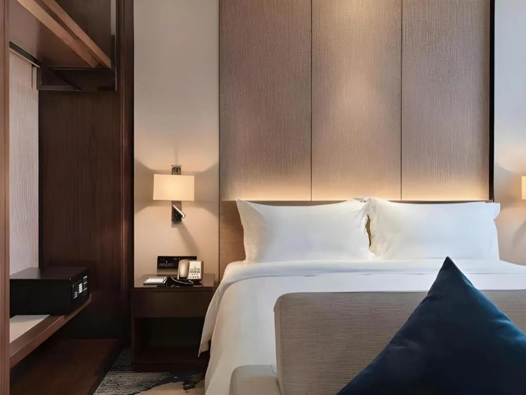 Bed in Zhonghao Boutique Hotel Dalang Business Center