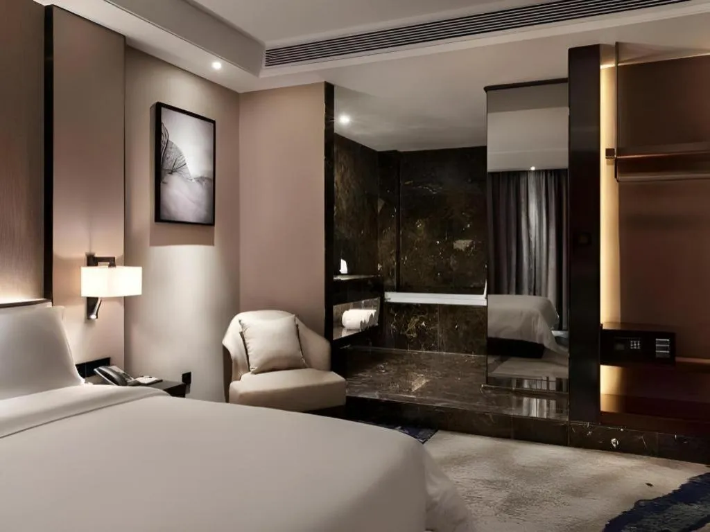 Bed in Zhonghao Boutique Hotel Dalang Business Center